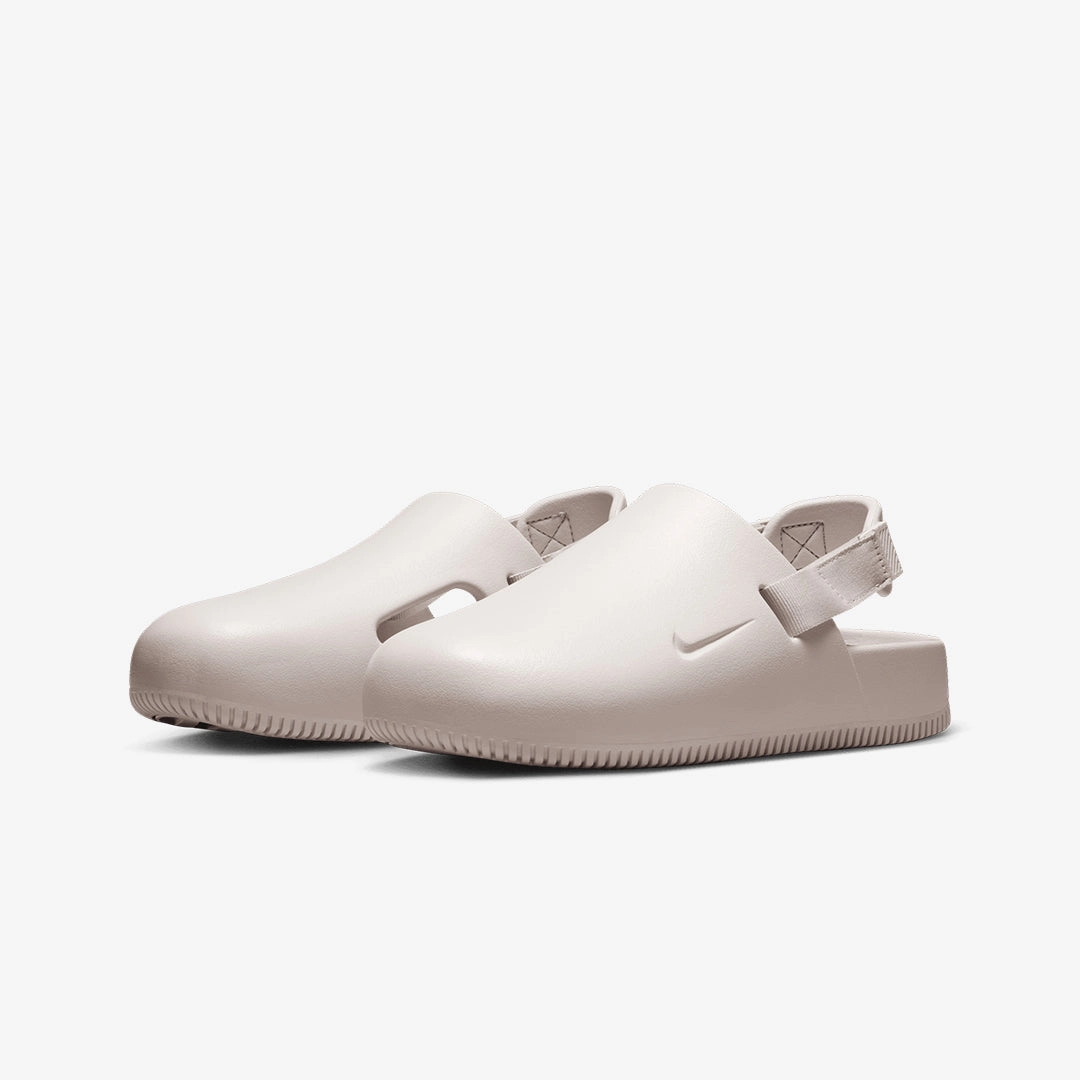 Nike | CALM MULES  { PLATINUM VIOLET/PLATINUM VIOLET