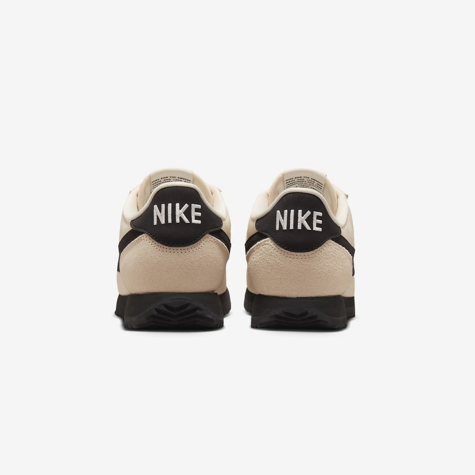 NIKE | CORTEZ TEXTILE { GUAVA ICE/BLACK-SAIL-PHANTOM