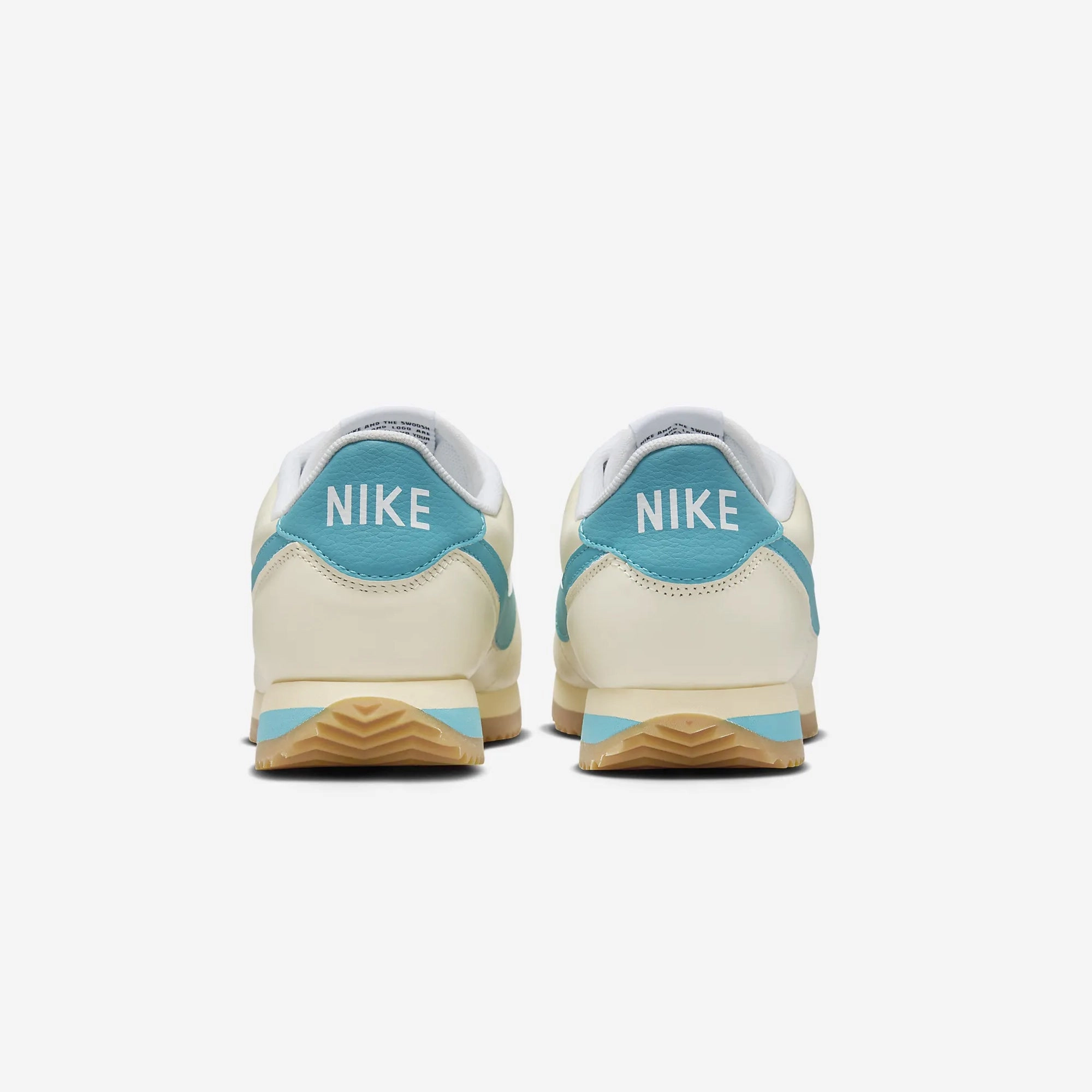 Nike | CORTEZ TXT  { COCONUT MILK/TEAL NEBULA-GUM YELLOW