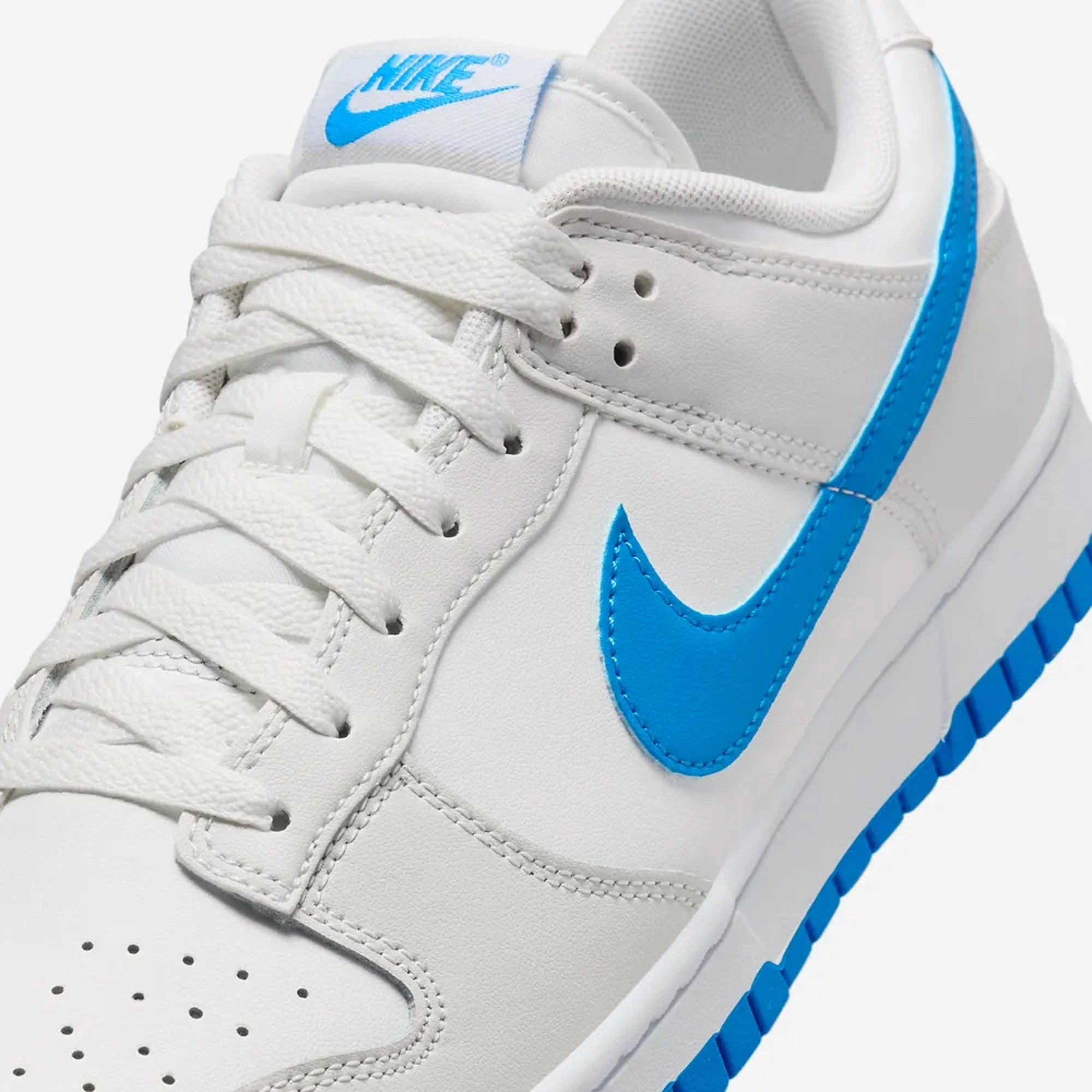 Nike | DUNK LOW RETRO  { SUMMIT WHITE/PHOTO BLUE-PLATINUM TINT